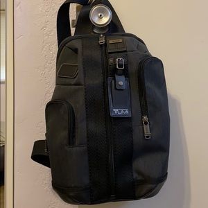 Single strap tumi bag